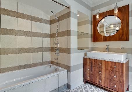 Custom Tile in Third Full Bath with matching Wall Treatment